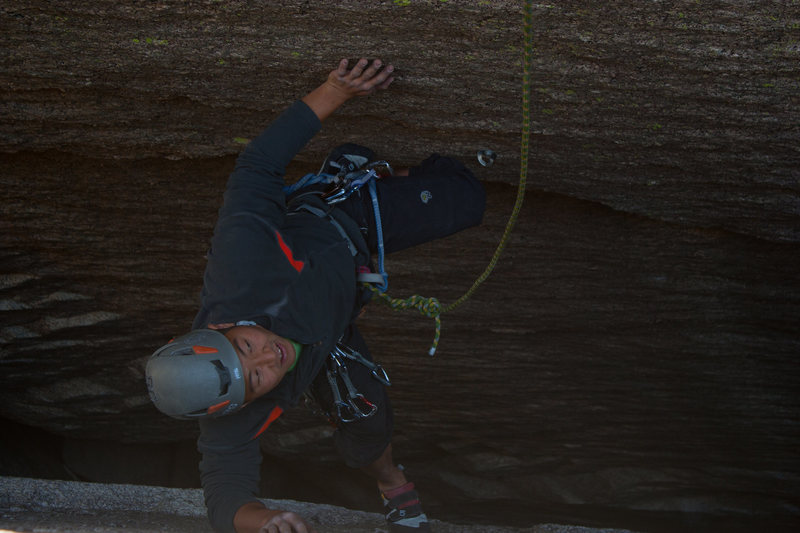 Grant coming up the 5.9 bolted chimney on the same rock formation. Great climb! Chimney goes for about 80 feet (maybe 90). Very sustained - it will wear you out. The last few bolts are pretty run out.
