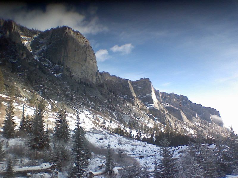 Flathead in winter, the route mainly follows the large weakness in the center right of the buttress.