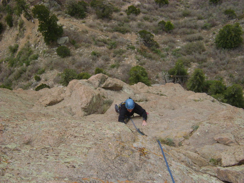 Richard traversing past the new bolt on pitch 3 - a real lifesaver!