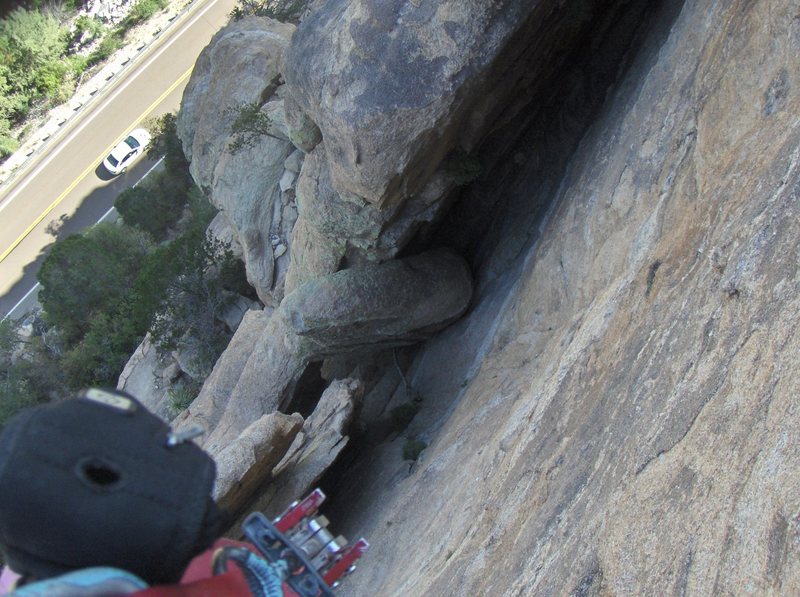 2 raps down the front with 70m rope, go through this awesome opening.