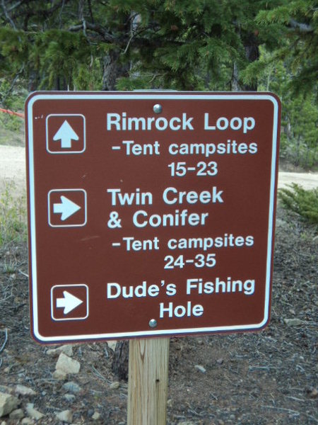 Once you see this sign, you're pretty close to the start of the trail. Go right.