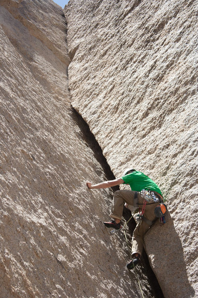 Reed Ames lie backing the squeeze chimney section of Getting Smaller