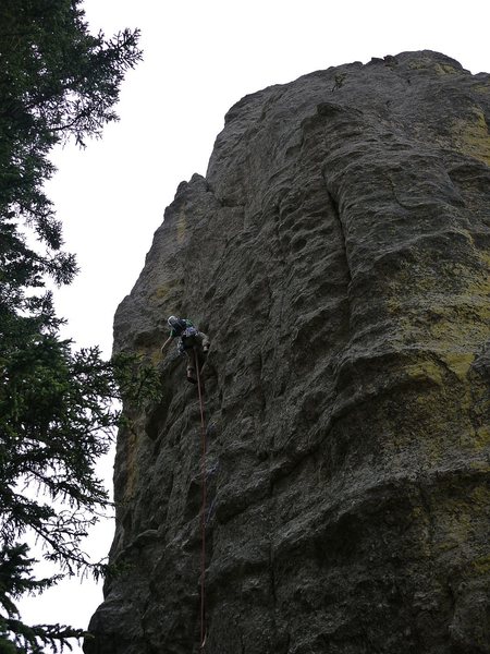 Photo is a little dark but shows you can climb straight up the face, more or less, until the ledge. Well protected. Probably the first time I got pumped on a 5.7, trying to figure out what to do next.