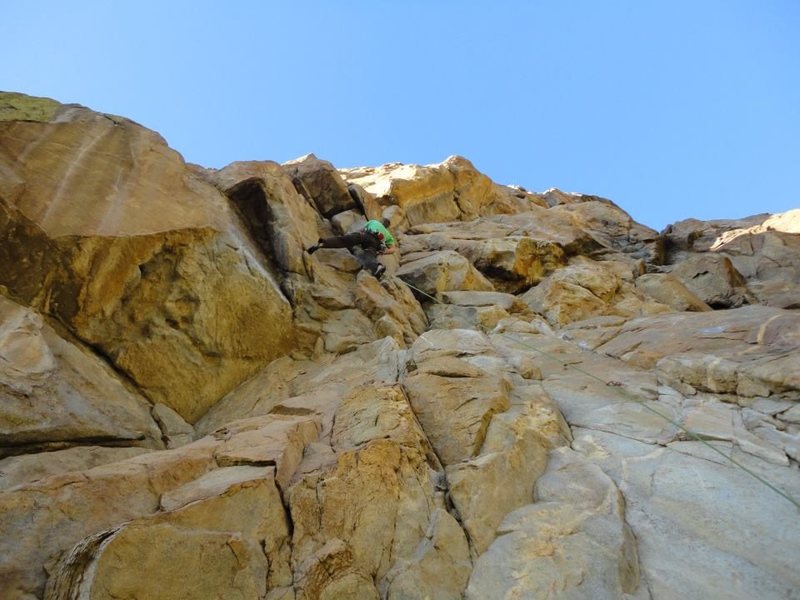 Randy Leavitt leading FA of "95 Degrees In The Sun" 5.11d, photo by Chris Hubbard