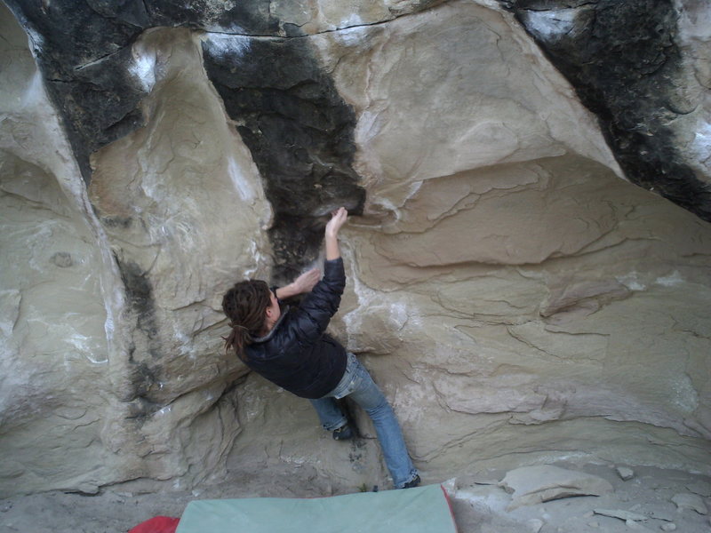 melanie brun on realizing gravity left to right v8/9 FA nate brun 2007