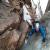 Pulling through the chandeliered and wet crux pitch, getting good sticks in soft ice, 6/2/12.