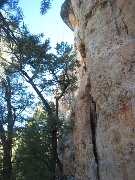 The starts to What's Biting Me? (R) and Solitude (L). The rope is hanging from the anchors of Solitude.