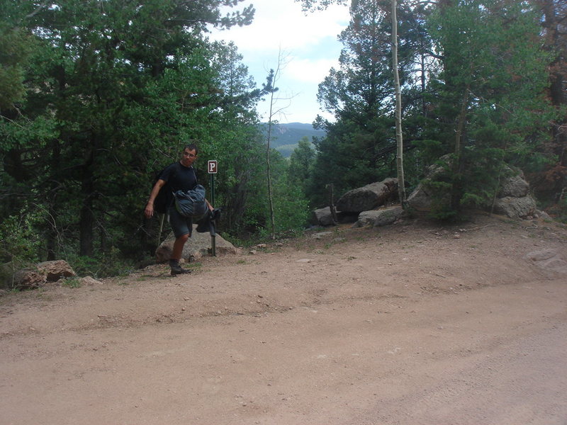I found the disparate descriptions in both newer guidebooks to be a little confusing. So park before or after mile marker 10, doesn't really matter. The trailhead is very close to the marker, across the road. This pic shows what you are looking for.