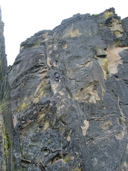 Pitch 7. Joe W. scared out of his mind. Could use a bolt right after the knife traverse since the rock is to loose for pro.