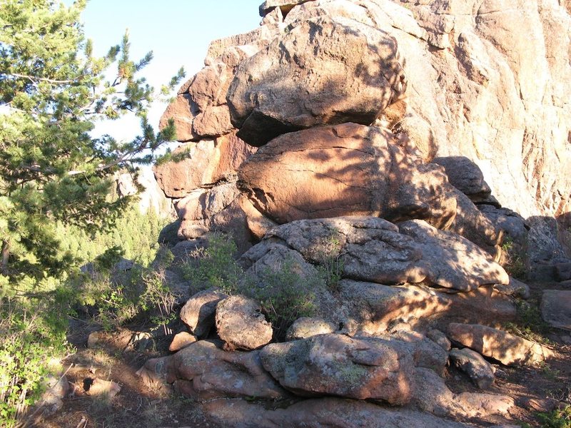 Looking left off the trail, to the left of the rock is The Training Ground, to the right is Scooter Trash Wall.
