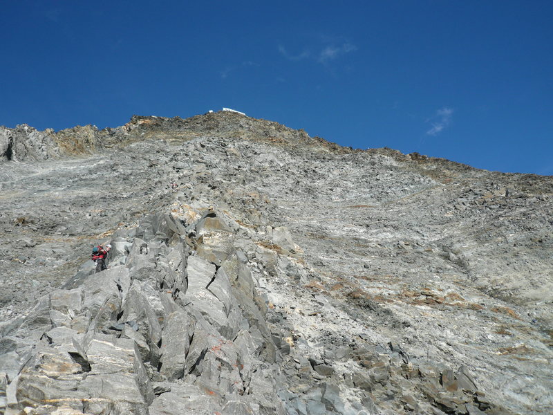 Going up the North ridge of the Grand Couloir looking toward the Le Refuge du Goûter.