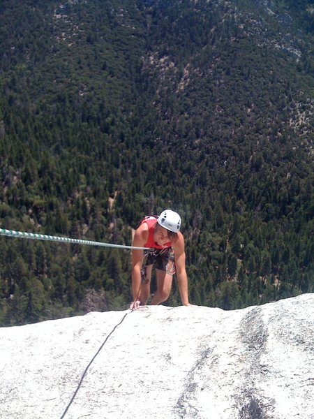 Chris topping out the last pitch of Revelation