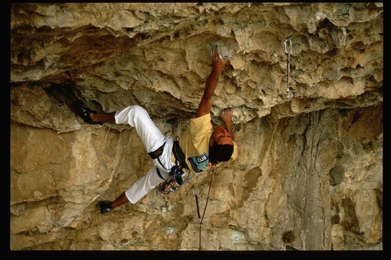 Mike Lewis finishing the entry moves and getting out onto the roof. Photo taken by Paul Barraza, 1999.