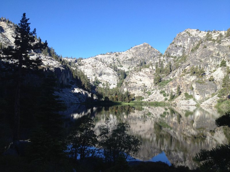 Eagle Lake in Tahoe. Climbing on both sides of the lake. Eagle Lake Cliff is in the shadows on the left side just above the scree slope that meets the lake.
