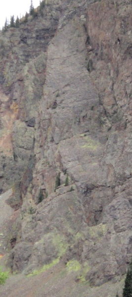 Climb starts in the right side of the yellow lichen which was slick after a rain the night before.