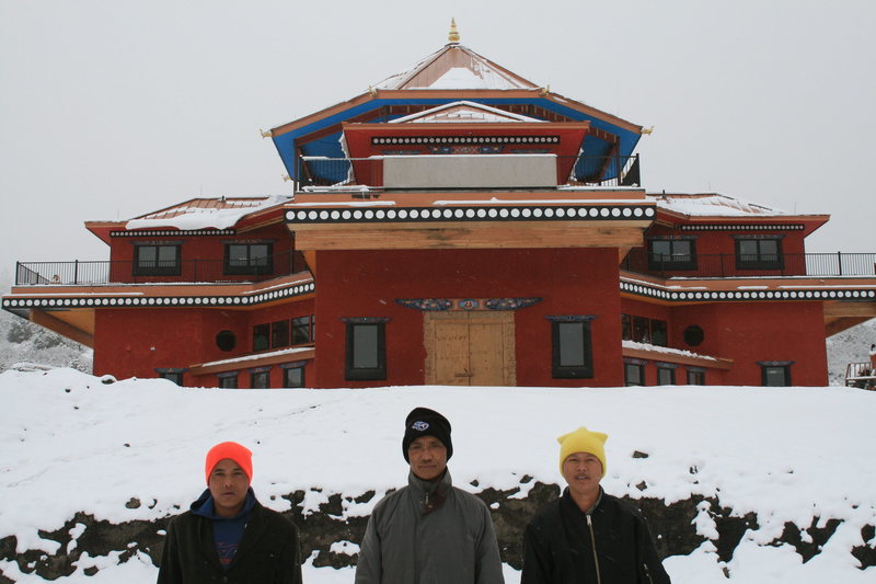Wamshu,Haba & Hum, the Bhutanese carvers flown in for a year and a half to insure accuracy and excellence. These guys were amazing and all went home with matching purple North Face down jackets.