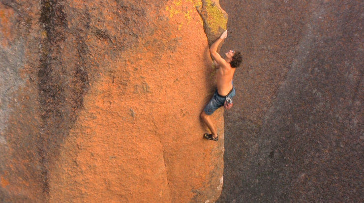 Black Pearl... one of only a few V8s, and one of the more sketchy, at Enchanted Rock State Natural Area, Texas. Gorgeous line up a blank arete. Stared at it for years.