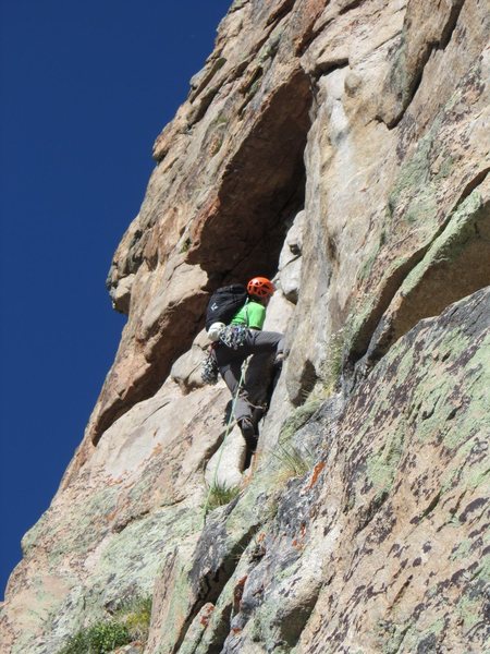 Moving up the dihedral to the roof of pitch three.