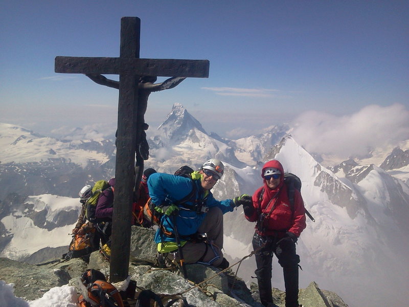 Summit of Zinalrothorn with my dad. Zermatt Switzerland. Photo taken by Armin Fisher Copyright
