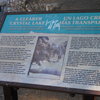 The sign commemorating the naming of Crystal Lake (eg. Sycamore Lake), by Benjamin Eaton, on the east shore of Crystal Lake.