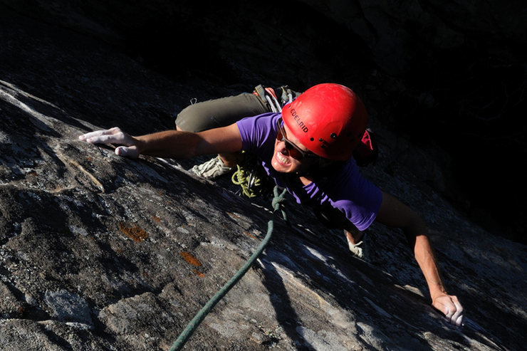 Colleen makes the long reach for the next crimp, on the 5.10 2nd-pitch variation of Face Lift.