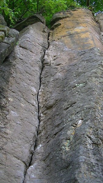 The route starts in the crack and ends on the yellowish face to its right.