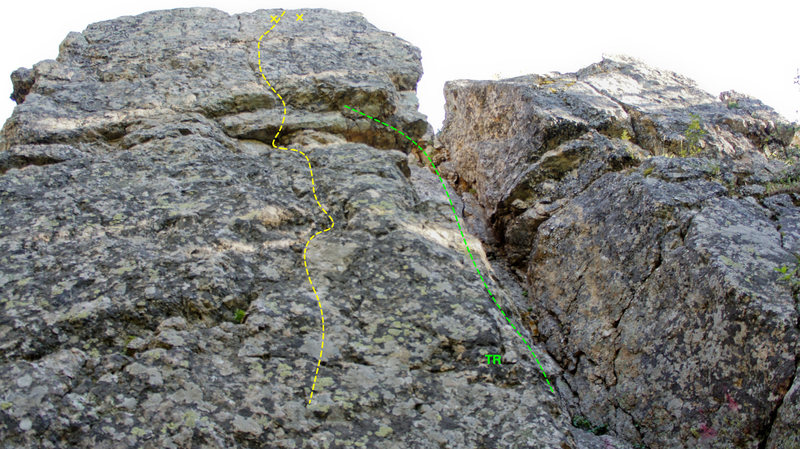 This is a fun beginning toprope a little further east from Greyface and Butcher Knife. Climbing up to the shallow shelf is an easy 5.6, with slightly trickier climbing from there. For toprope access, we climbed the easy crack around the dihedral.