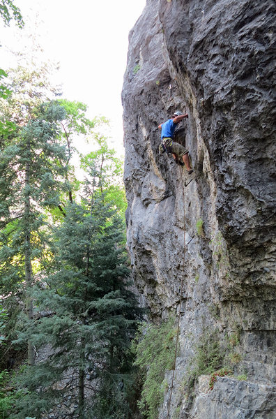 Jon Scoville climbing through the cruxy bit.