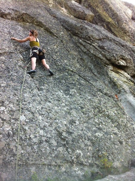 Kristy, finally climbing with pro after passing the crux, and the first bolt (in that order), on Life Without Beer.