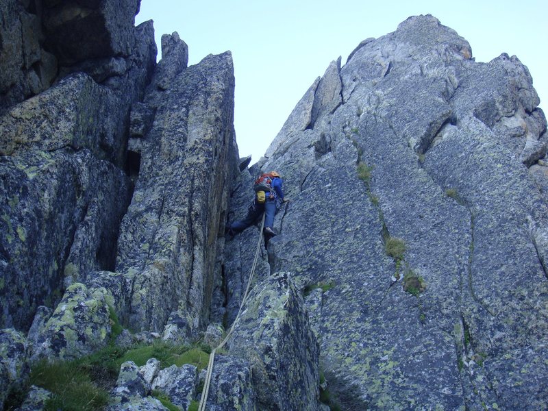 Victor starting the climb on the very beginning of the first pitch