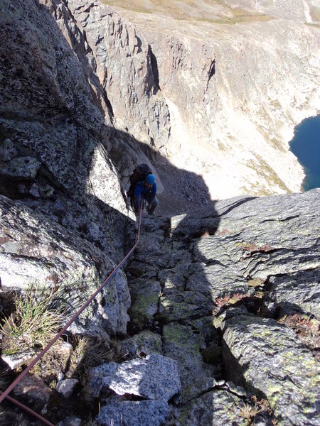 Joe approaches the notch at the top of P7. There is a mouse living up at this belay.