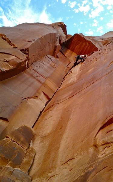Adeline climbing past the arcing section.