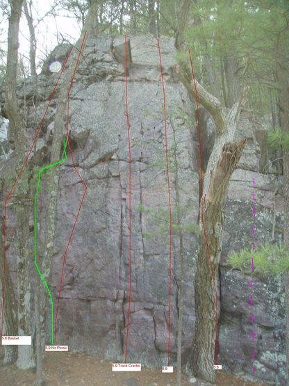 V0-V1 boulder problem marked in purple dashes on the far right. Ends at nice walk off ledge. Super fun sequence with beauty landing.