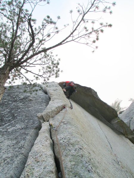 Jonny about to pull the roof- <br>
<br>
(Climbing in the clouds on 9/11/12)