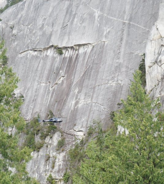 Helicopter in front of the Chief, to rescue a stuck tourist who scrambled up the gully and got stuck