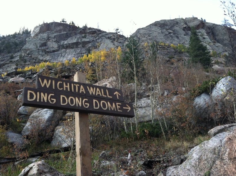 The upper sign with Wichita Wall and Ding Dong Dome in the background.
