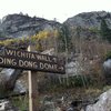 The upper sign with Wichita Wall and Ding Dong Dome in the background.