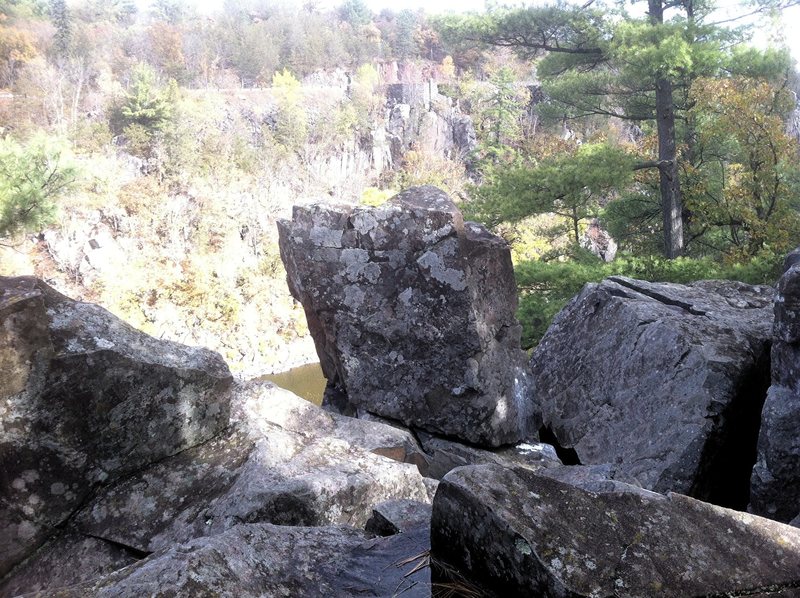 The small column in the Picnic Area prow. It is easy to sling an anchor right over the top of this little column, and your rope will hang about in the middle of the face.