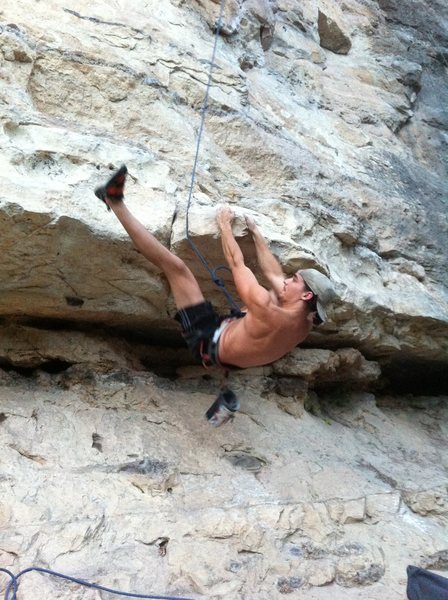 Off to the left of bird dog is a fun boulder/mantel problem to start the route. Two hands on the point, feet off to the right, then work your feet left, to a heel hook with the left foot and good luck with this tricky v3+ start, it is the hands after the heel hook that make it difficult.