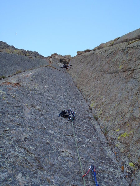 Near the top on Soaring, September 2010. It's classic stemming all the way. Anchors just below the roof. The guidebooks suggested I might need gear, but a little way up I could see that it was bolted all the way, so I dumped the rack on a bolt. Photo: Kristin Felix