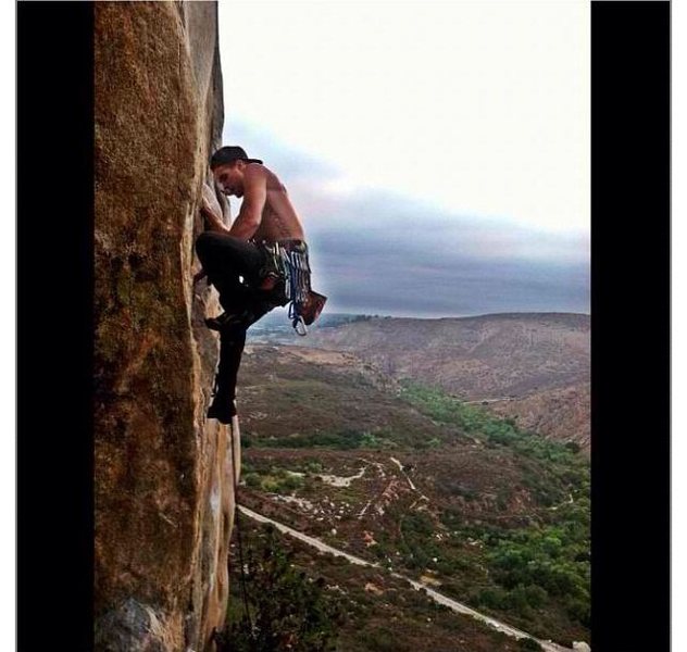 Myself gettin through the crux of Karmic Relief. 5.10a.