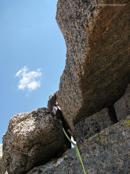 Gaining the summit block; a huge, flat capstone.