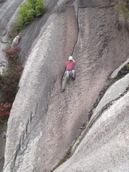 A climber on P2 of Trail of Tears.<br>
Photo by Tom Bowker