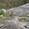 Looking down the cliff from the belay at the top of P3 Trail of Tears.