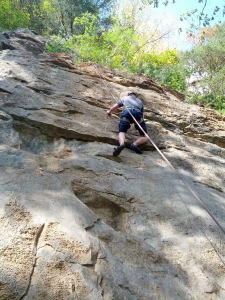 a beginner climber sends Independence Day on a warm fall day in October 2012.