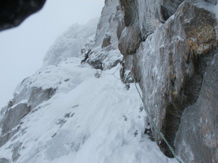 Scotty Vincik leading the slabby, left facing corner on Ski Tracks