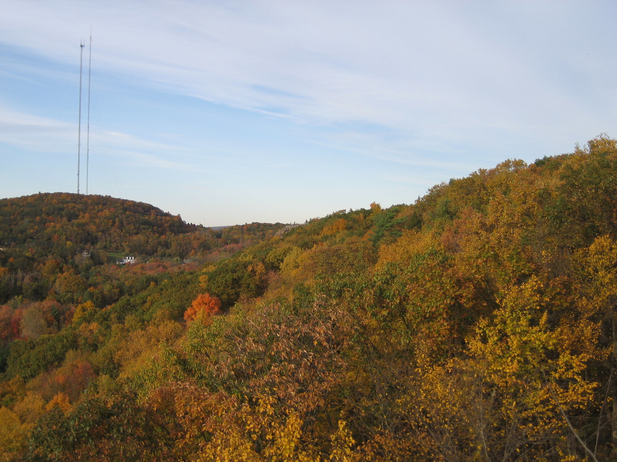 The view north. Two people on top of Pinnacle deadcenter, Rattlesnake