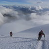 Climbing out of the clouds and into the sun on Cotopaxi