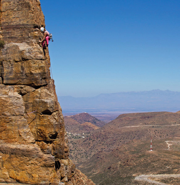 Lorne Brown on the photogenic arete of Raindance 5.10a, at Imrir Village Crags on tnhe Tizi Escarpment, photo Emma Alsford