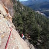 Deb frees the line on TR.  This shot is taken from the lower belay, a 2 bolt anchor at 115'.<br>
<br>
FWIW, pro to TR for directionals: red Alien/orange TCU and/or #0.75 Camalot, #3 Camalot, #1 Camalot.